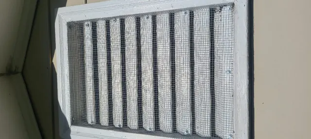 Attic louvered vents custom screened after bat removal · Louisburg
